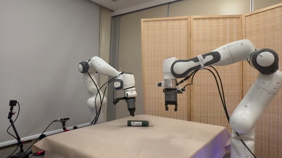 Two robot arms opening a bottle in the first scene configuration